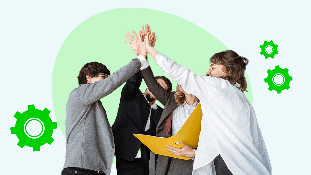 A team of people giving each other a high five