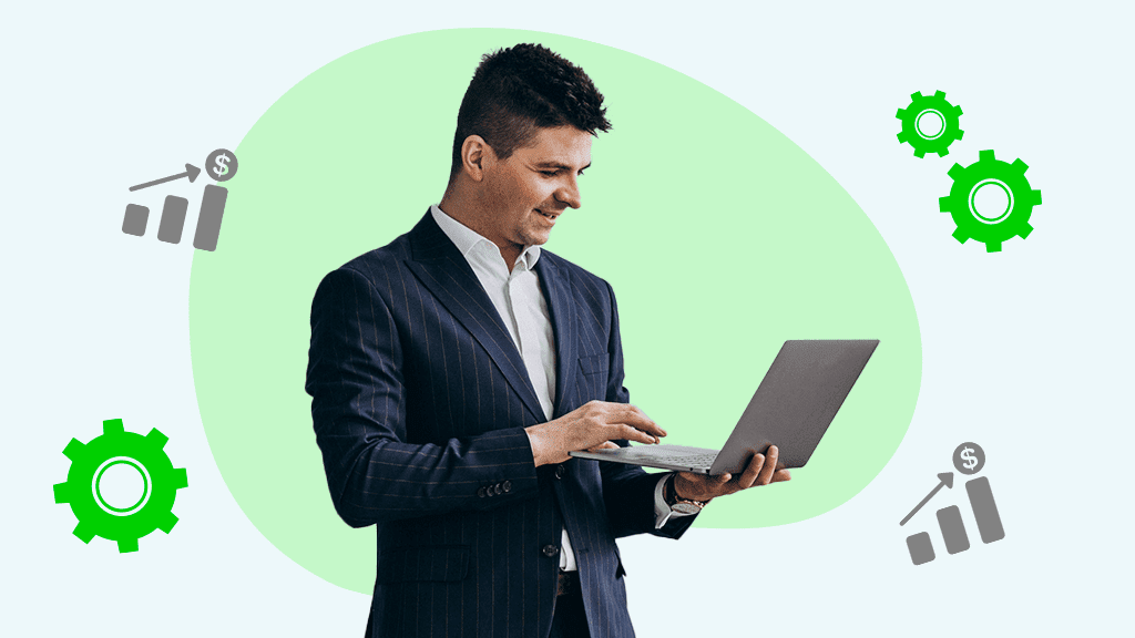Man in a suit looking at a laptop