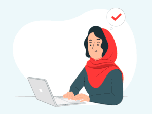 Cartoon woman in a hijab working on a laptop
