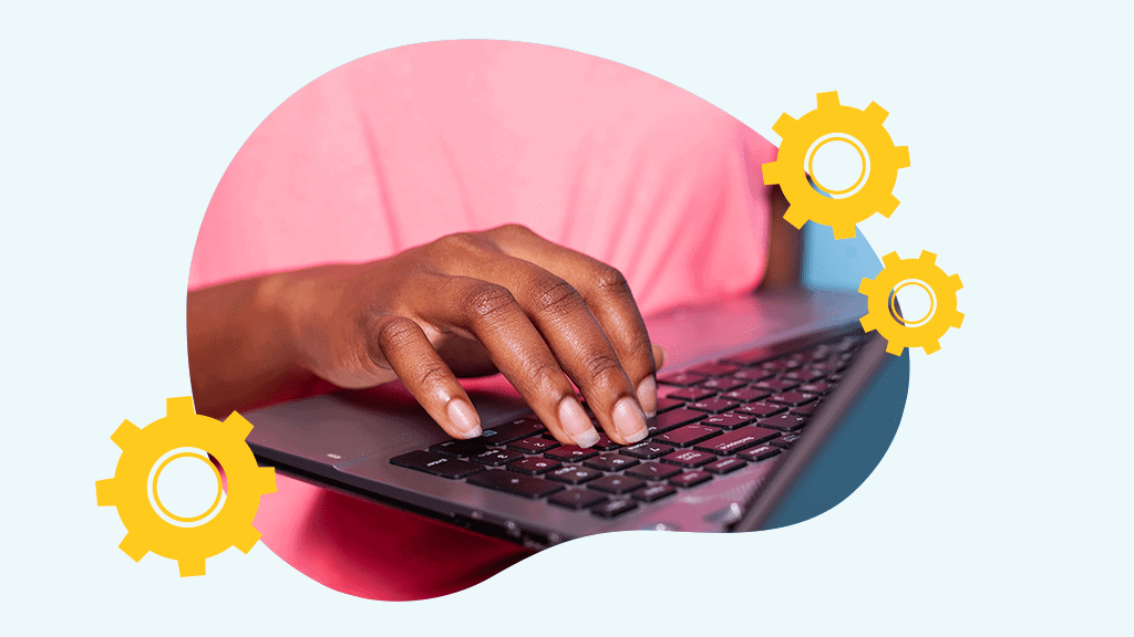 Close up of a hand typing on a laptop