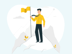Man with a flag at the top of a mountain