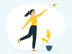Woman throwing a paper plane